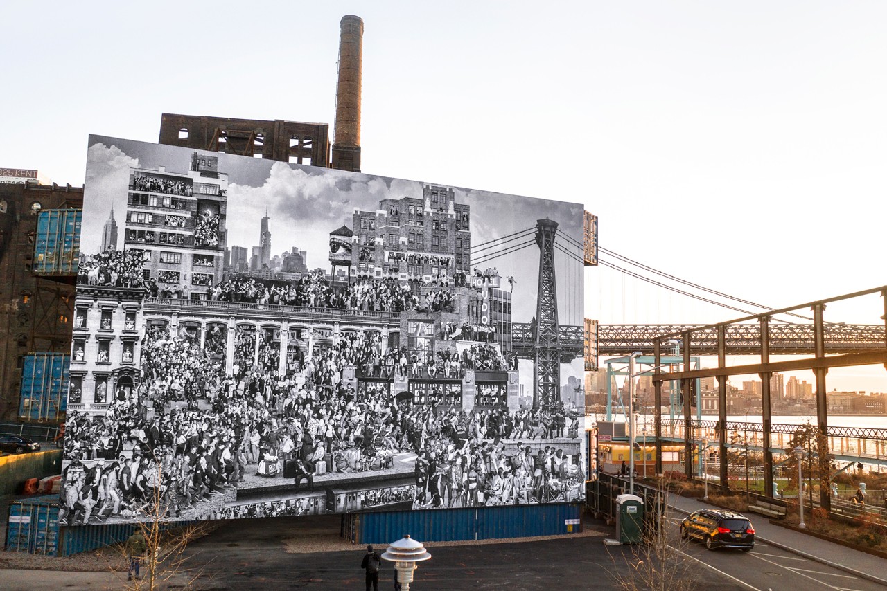 Art| JR Returns To NYC With New “The Chronicles of New York” Installation
