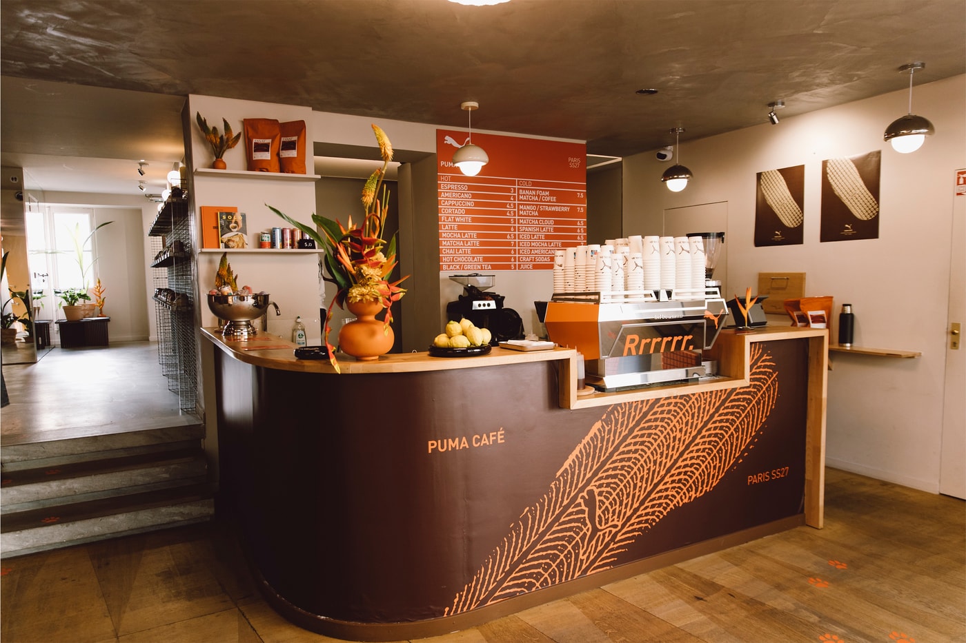 Design| Two Signature Silhouettes Are The Center Piece at The PUMA Cafe