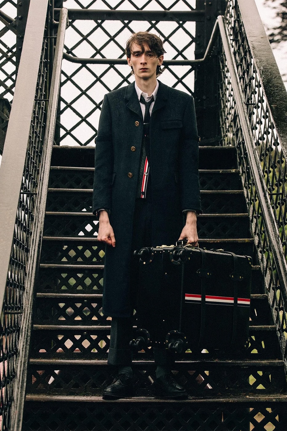 Design| Thom Browne x Globe-Trotter Redefine the Art of Luxury Travel With a Handcrafted Luggage Collection